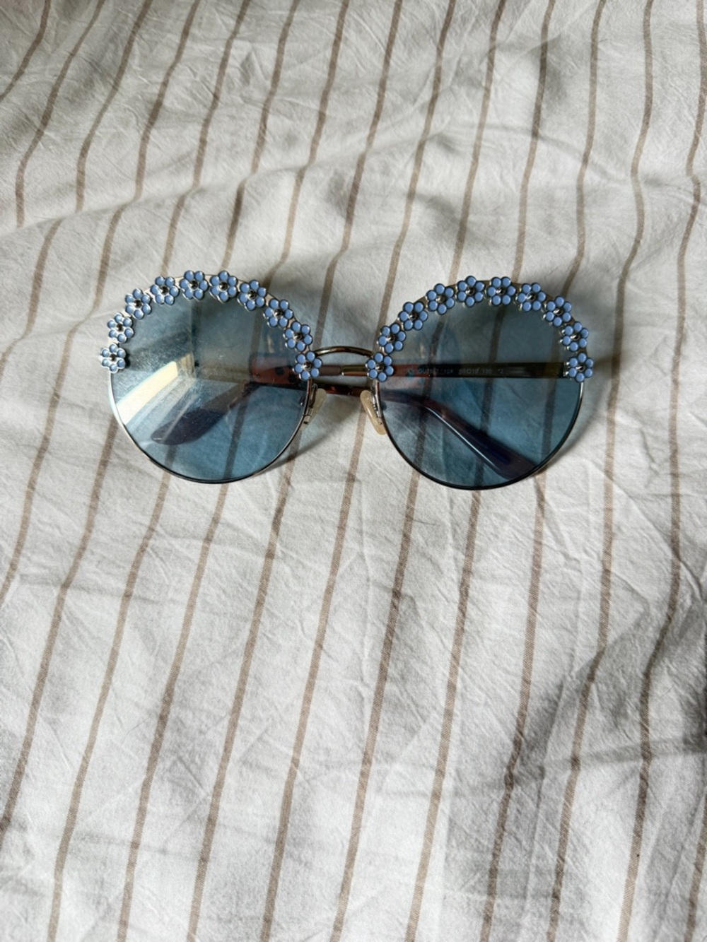 Guess Blue Round Sunglasses with Floral Accents